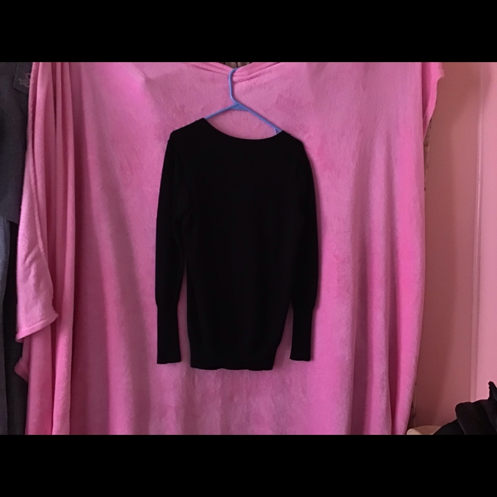 Really nice black sweater to wear on a cool night.